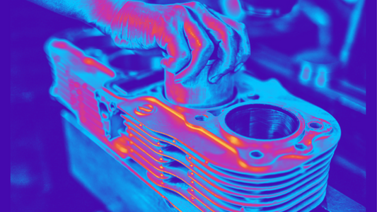 inoue boring カスタム Gem 思考プロセスを表示 A technician installs a new cylinder sleeve into a motorcycle engine block, shown in a thermal imaging style.
