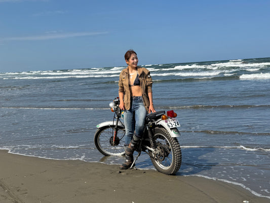 Beautiful Lady and IHATOVO(TL125S) on the beach.